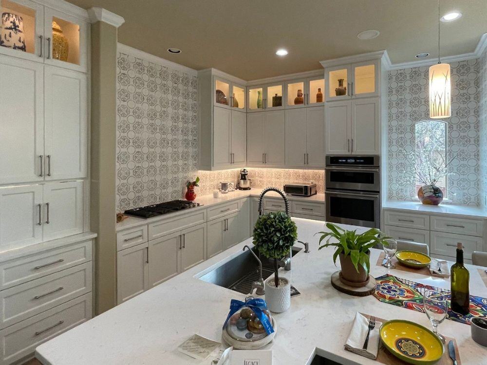 Patterned Backsplash in Remodeled Kitchen with Sink in Island LBK