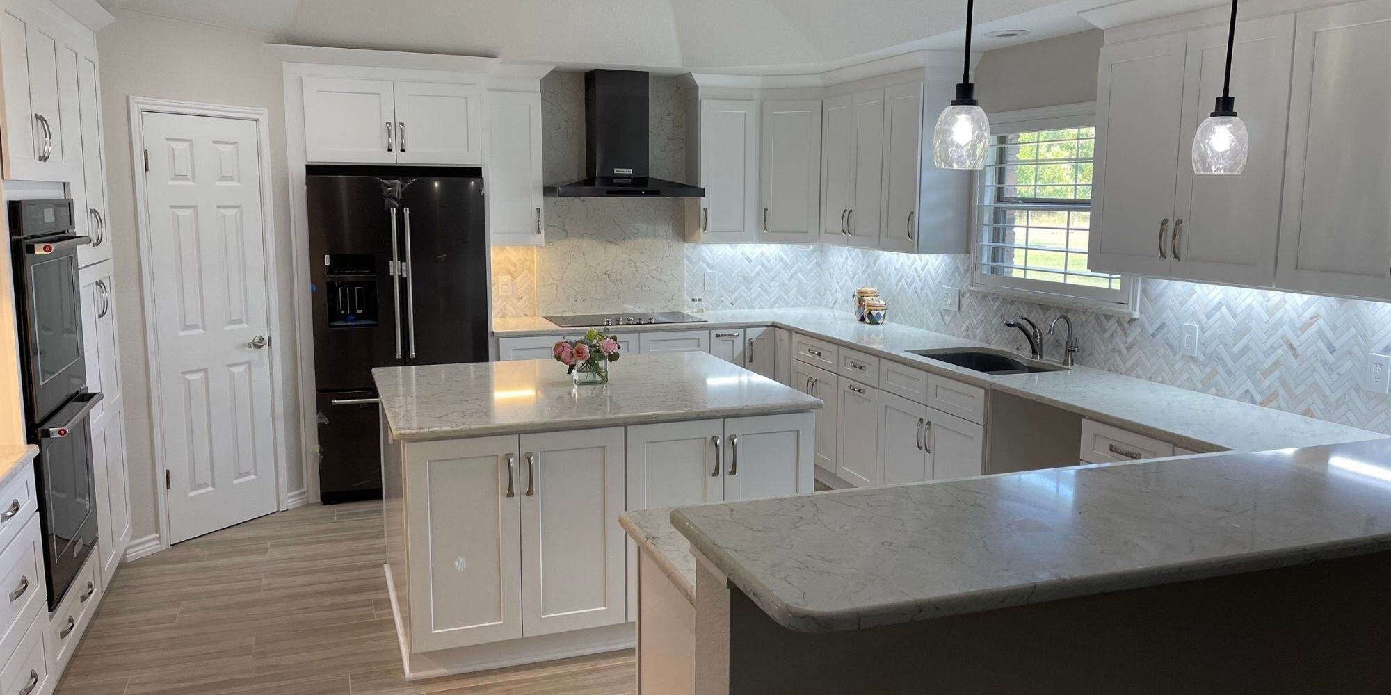 kitchen remodel in san antonio with white cabinets and kitchen island