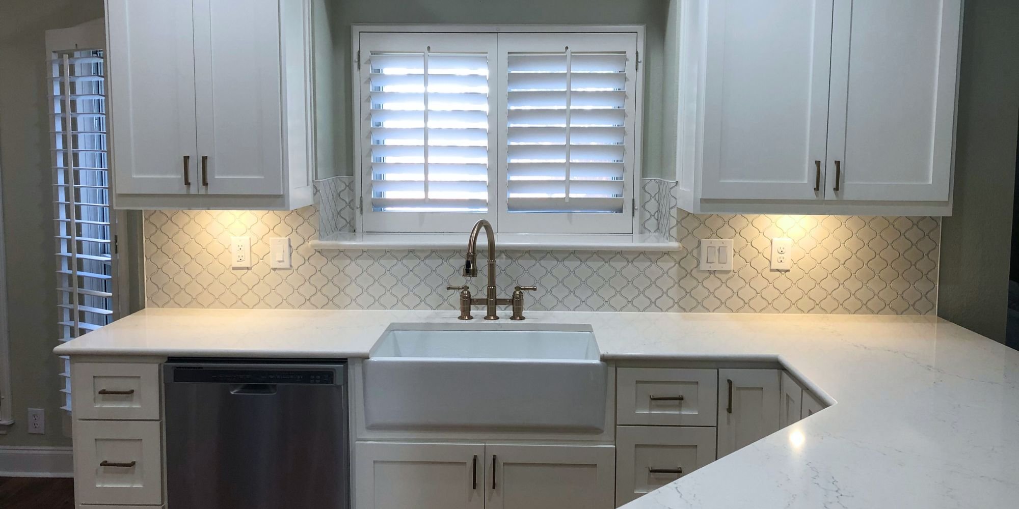 kitchen remodel in san antonio with white cabinets and countertop