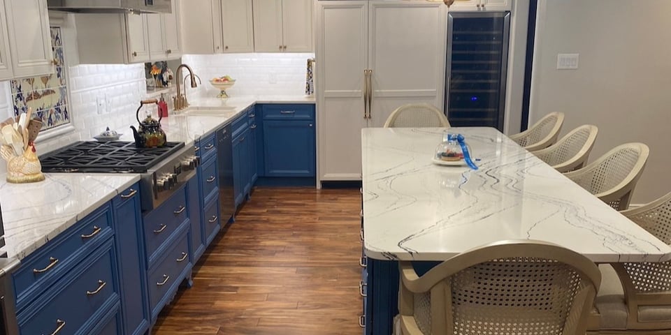 San antonio kitchen remodel with blue cabinets and a large marble kitchen island
