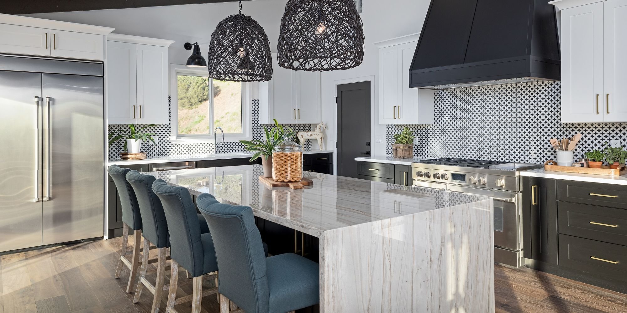 San antonio kitchen renovation with black and white aesthetic and waterfall edge kitchen island
