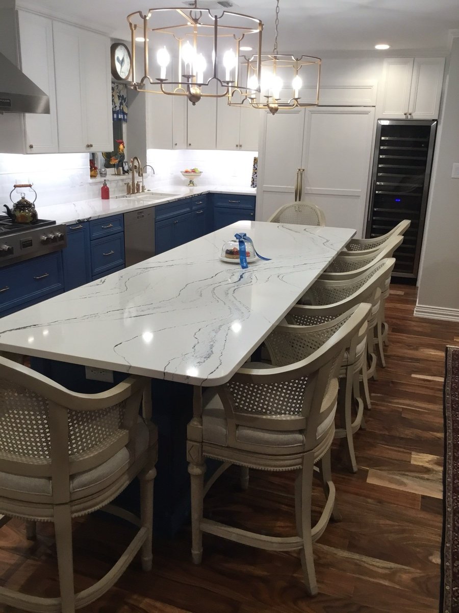 Navy drawers below COFFEE sign and rooster mug rack on subway tile