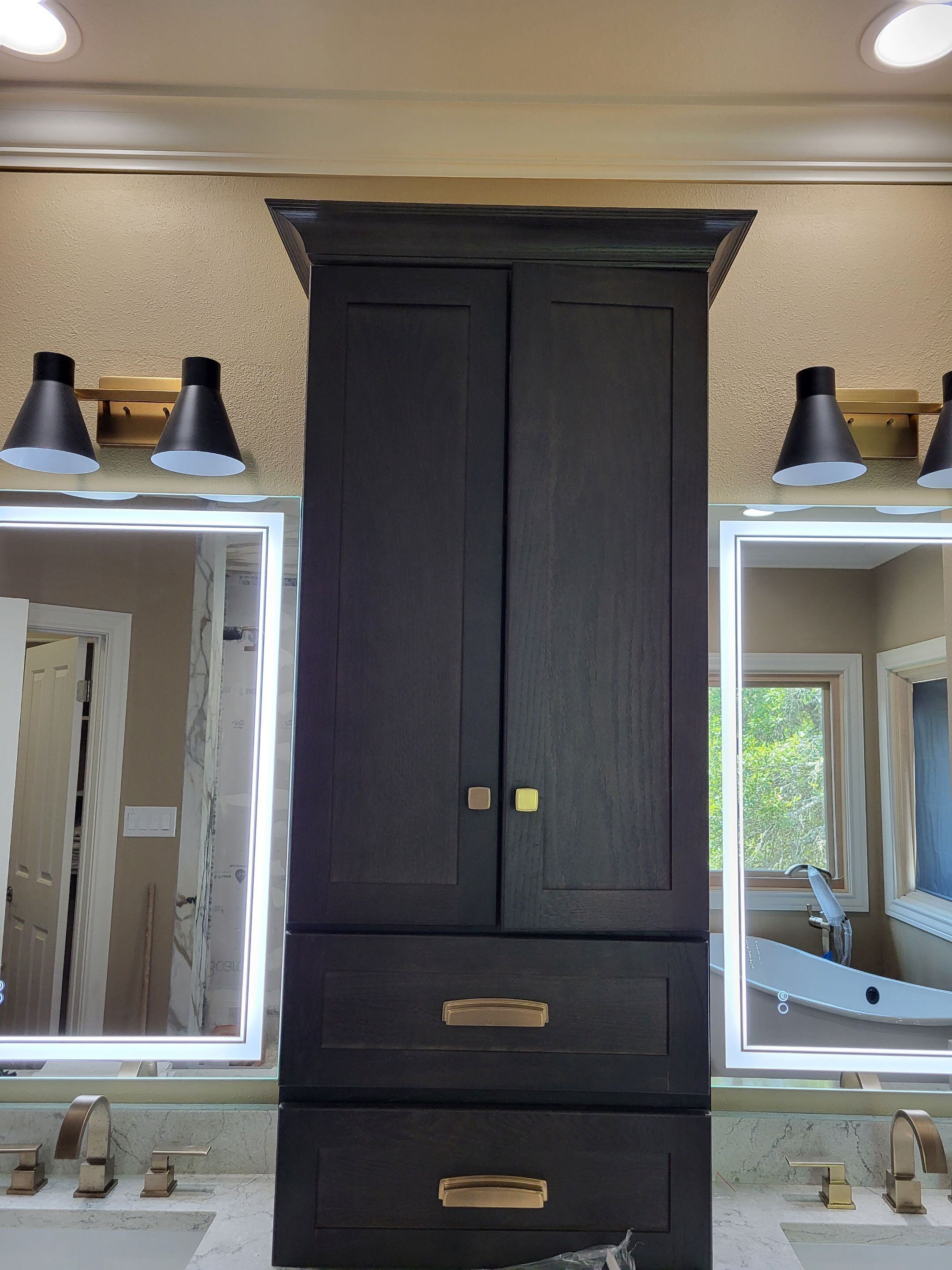 dark custom cabinets and double sink vanity in a san antonio primary bathroom remodel