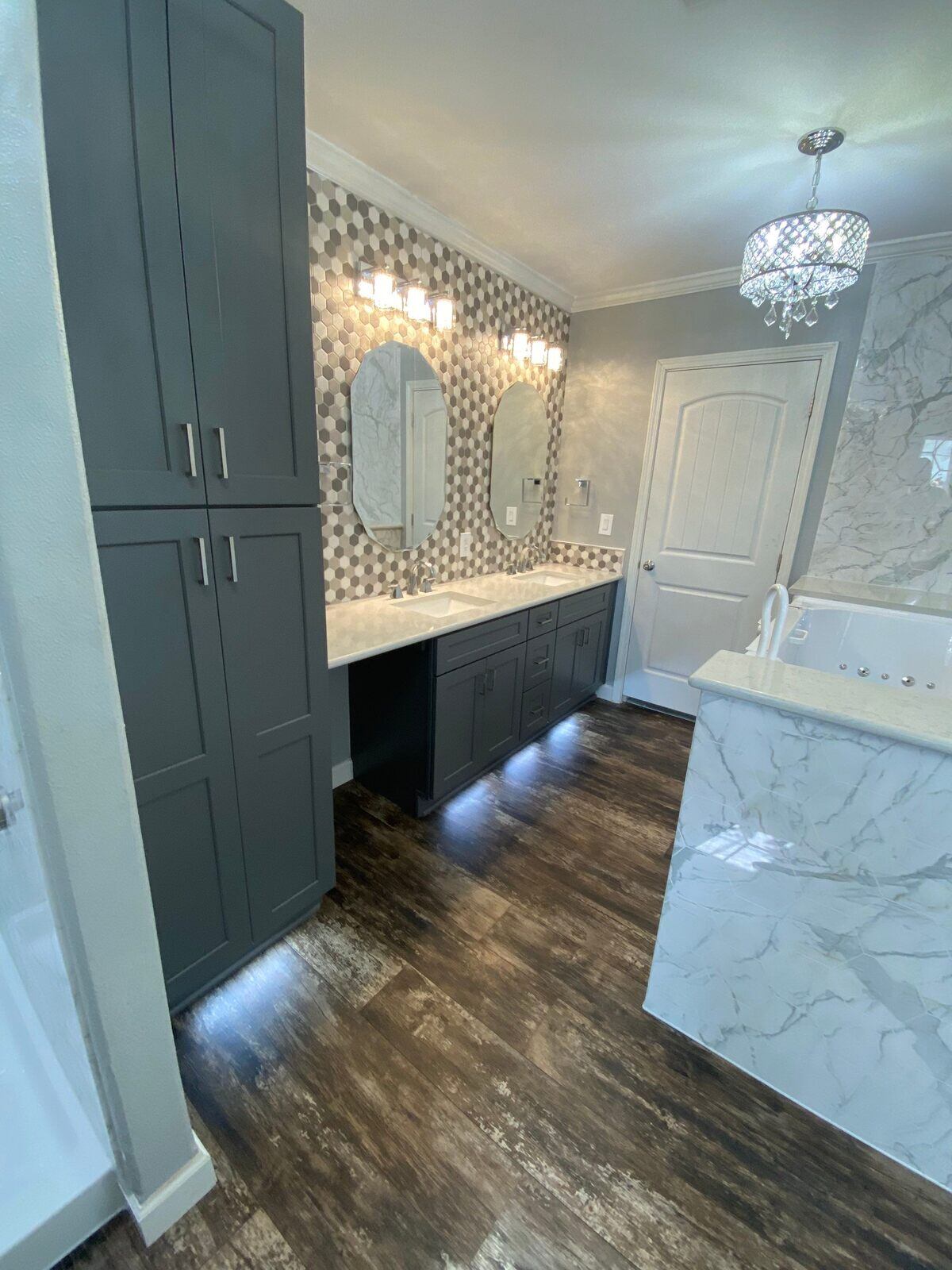 Bathroom with walk-in tub and marble accents remodeled by Legacy Kitchen & Bath in San Antonio
