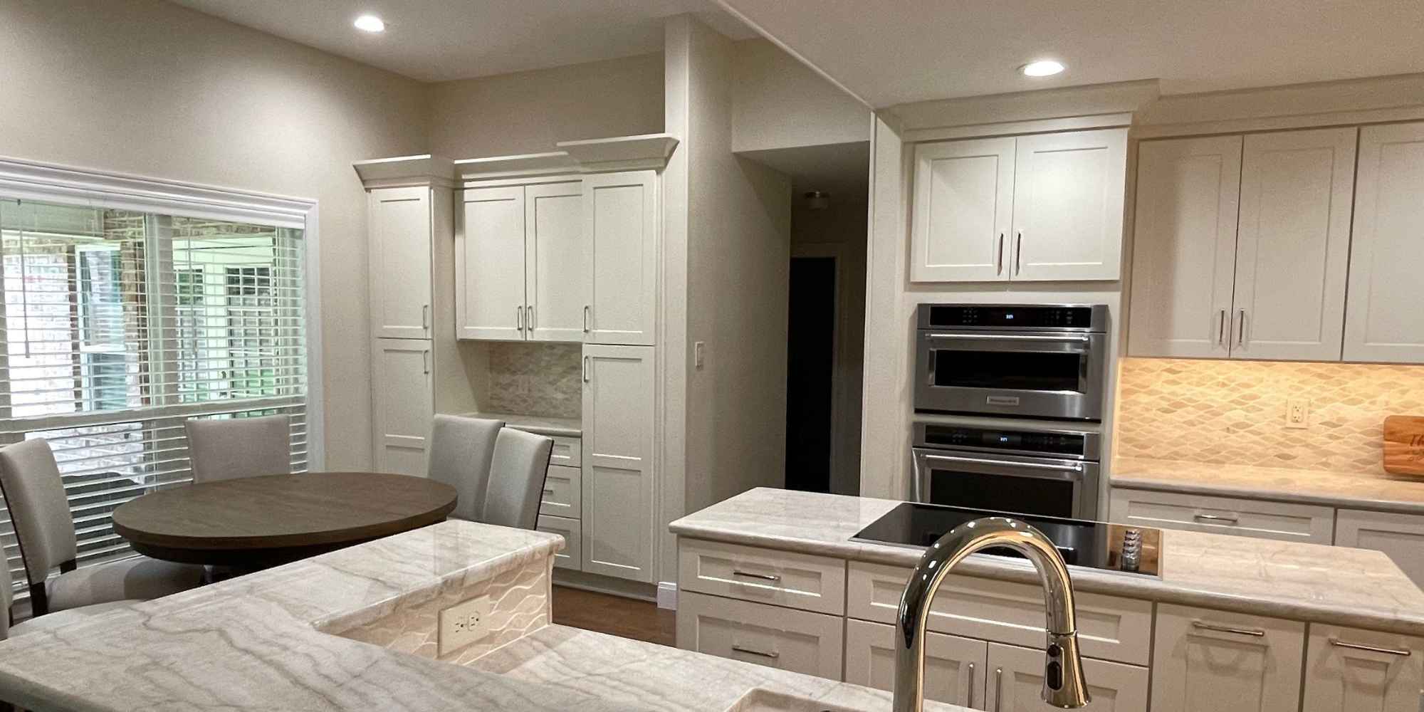 San Antonio Kitchen Remodel with Chrome Features and Ivory Shaker Cabinets